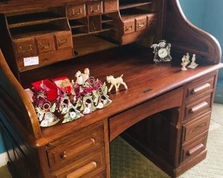 roll top desk --can you see the many unused gift items?