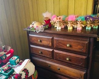 tables laden with Hallmark Christmas ornaments and TROLLS