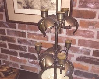 a precious vintage brass and ceramic votive candle holder