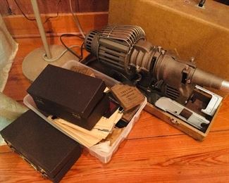 1920's slide projector used int eh 20's at LSU Medical School and boxes filled to the top with medical slides from the 20's.  Some are pretty graphic