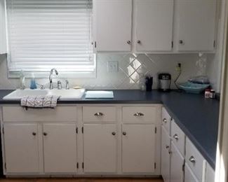 Nice white kitchen cabinets with stainless steel hardware