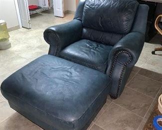 Blue leather chair with ottoman.