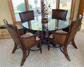 Glass top table + 4 chairs wicker