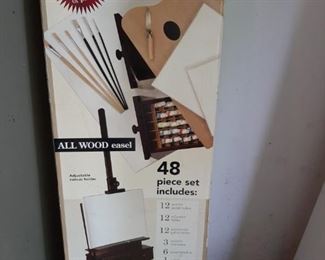 $48 - G111 - Battat Art Studio includes paint, wood easel, brushes, & canvases.