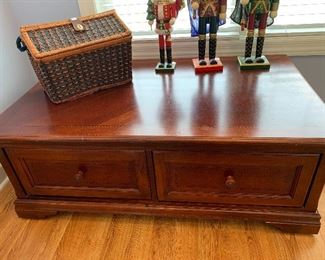 	#23	Cherry look coffee table with inlaid top and 2 drawers 50"x30"x18"	 $30.00 	
