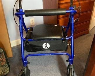 	#58	Walker with hand breaks and seat	 $20.00 	