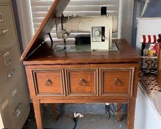 	#73	Sears Kenmore sewing machine in cabinet	 $20.00 	