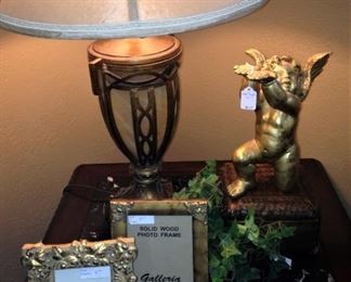  One of two matching lamps; frames; cherub 