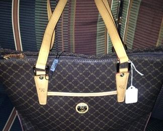 Fine and new ---  Rioni handbag (matches the luggage)