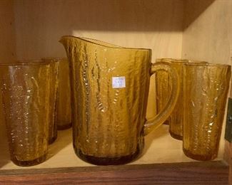 Harvest gold water pitcher and six glasses