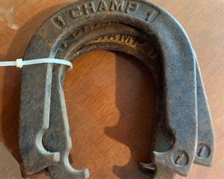 Antique champ horseshoes including stakes