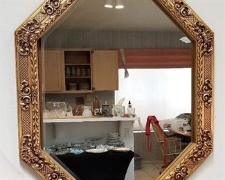 Detailed heavy gold beveled mirror. 