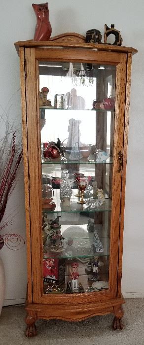 Just the right size china cabinet. ...tall and narrow to fit just about anywhere. Not too big. It is lighted.