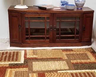 New looking rug with great colors. Console/entertainment/storage unit