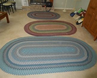 We have (4) braided rugs - the forefront is the largest at 8' X 4'
