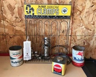 Vintage Mobile Oil Cans and DuPage Clamps Wall Unit