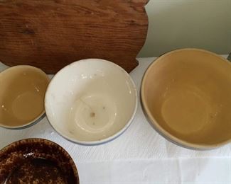 Lot 8:
Yellow ware stoneware bowls
Pig cutting board 
Kitchen crock etc