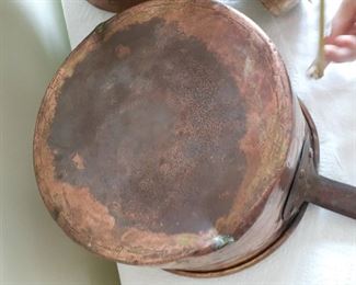 Lot 11:
Brass/ copper Country milk jug 
Copper pot ( has small crack on bottom) 