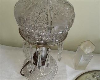 Lot 15:
Crystal boudoir Accessories 
Crystal lamp 
Mirror 
French perfume bottle 
Tissue holder 