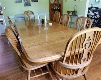 Oak dining table, four leaves 103 with leaves in 46Wx30H, eight chairs $300