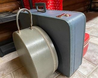 Vintage suitcases including Samsonite