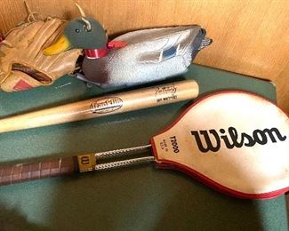 Sports equipment including Wilson tennis racket and bat