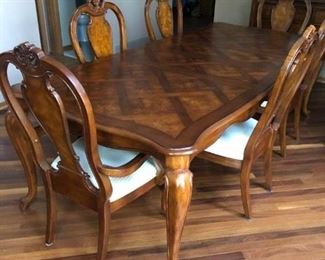 https://caitsonline.com/collections/orland-park-may-22nd-sale/products/oes-inlaid-dining-room-table-chairs-and-china-hutch