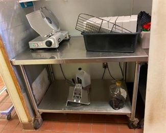 Stainless steel table with under shelf
On wheels
48x30x36