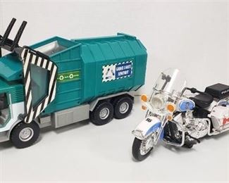 Battery Operated Police Motocycle (works) and Garbage Truck (needs batteries)