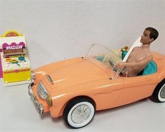 1960 Ken driving Barbie's Convertible ( front bumper damage) and Pizza Oven