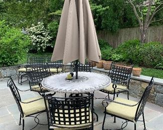 Patio table with 6 chairs, cushions and umbrella $750