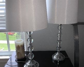 Pair on lucite and metal lamps $150