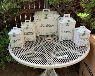 Vintage wrought iron patio table
5 piece canister set , French kitchen style