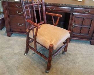 #19 ~ ($200) Log Office Chair with weathered leather seat and wheels! 