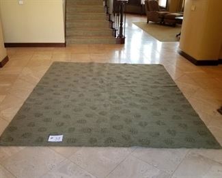 #38 ~ ($100)  Sage green woven rug with leaf pattern on both sides! 9.5' x 8'.  Can be flipped