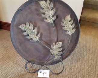 #44 ~ ($30) Very Large Metal Decorative Platter with Leaf motif – Has a kickstand or can be hung on a wall- 26” diameter 