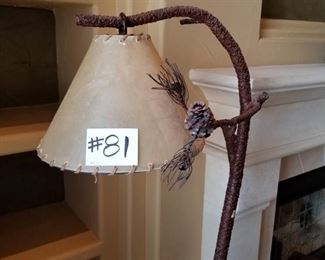 #81 ~($300)  Closer view of  Iron Western Floor Lamp with Cowhide shade- iron base resembles a  tree branch with acorns- 66" H