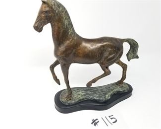 #115 ($40) solid metal (bronze)? horse statue  approx 10" tall.