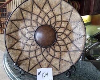 #124 ($50) large impressive platter, comes with iron stand, measures 23" diameter.  Stone look. Heavy.
