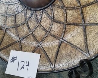 #124 ($50) large impressive platter, comes with iron stand, measures 23" diameter.  Stone look. Heavy.