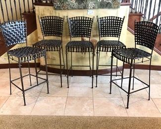 #123 ($100 each) unique bar stools  with 30" seat height.  Real leather straps make up the seat and back.  On a metal frame.