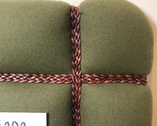 #202 ~ ($60)  moss colored fabric twin headboard with braided real leather accents.  No hardware. 