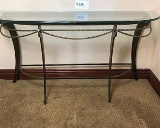 #205 ($200) HEAVY hall/console table with glass top (removable) and metal/brass base. Rope theme.  59"W x 20"D x 30"tall.