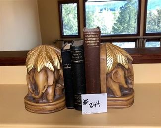 #244 ~ ($20) Heavy Elephant bookends set, gold painted leaves on top of elephants.