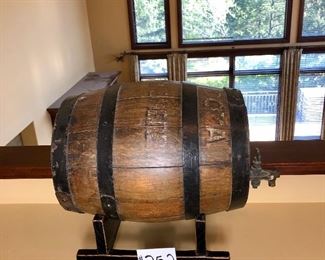 #252 ($60) decorative wood barrel on stand. 15"X x 11"D x 15"H