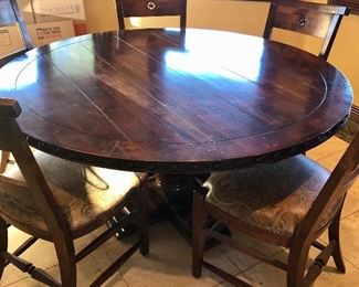 #263 ~($400)  Large round pedestal mahogany table with 6 chairs. (one not in photo).  5ft diameter pedestal table. Good condition! 6 chairs are solid wood with real leather seat cushions, all in very good condition!  6 chairs separate are $250 for the set. Table alone is $150.