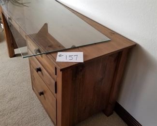 #157 ~ ($60)  Solid Pine Desk with protective glass top.  Good condition ~ 60" x 25" x 29.5" high.  