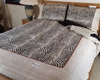 #159~ ($50) Animal print queen size bedding, includes duvet, sheets, shams and pillows.