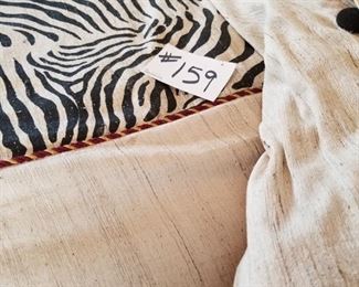 #159~($50)  Animal print queen size bedding, includes duvet, sheets, shams and pillows.
