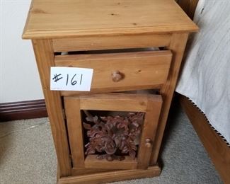 #161 ~($75) Pine Night Stand that matches the queen size bed frame.  Wrought iron leaf design.  Measures 17"W x 14"D x 28"H.  Great condition! Comes with a protective glass cover. 